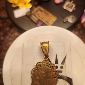 14kt gold Jesus on cross Medallion.